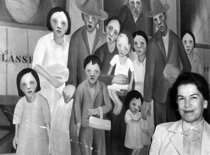 Foto de Tarsila do Amaral, de 1961, com sua obra Segunda Classe.